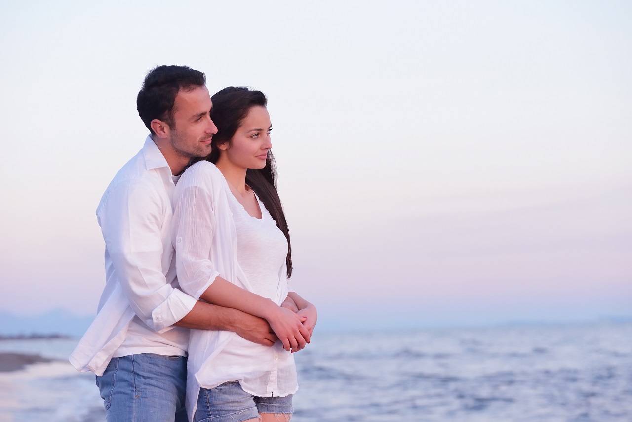 Happy couple on beach